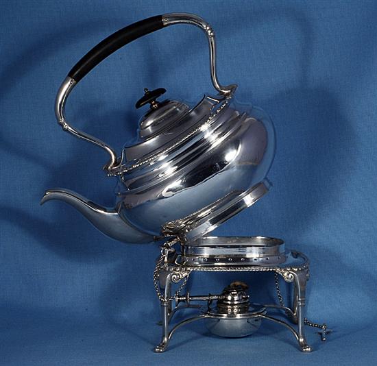 A silver kettle on stand, Height 12 ½”/318mm Width 10”/254mm., Weight 50oz/1418grms.